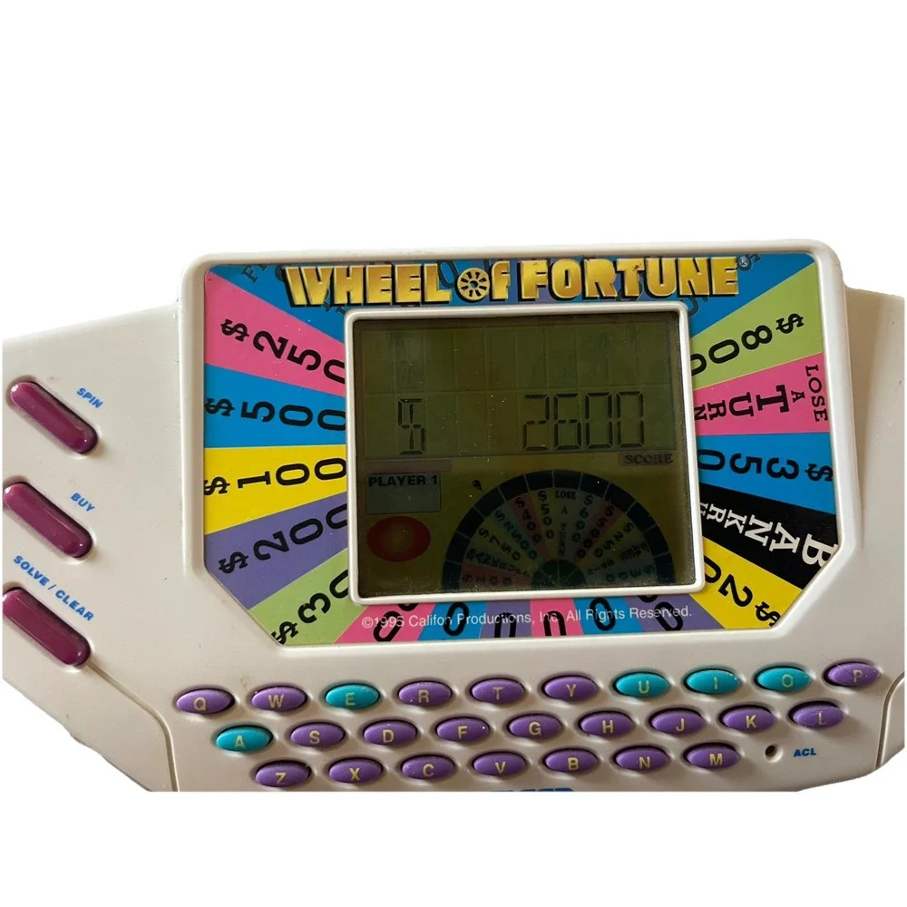 Vintage Tiger Electronics Wheel of Fortune Handheld Game Fun Family Working 1995